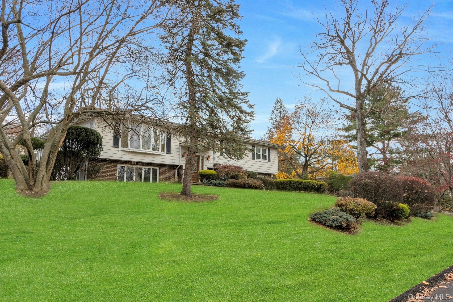 44 Greenridge Way Spring Valley, NY 10977 - Photo 36 of 46 a view of a house with backyard and sitting area