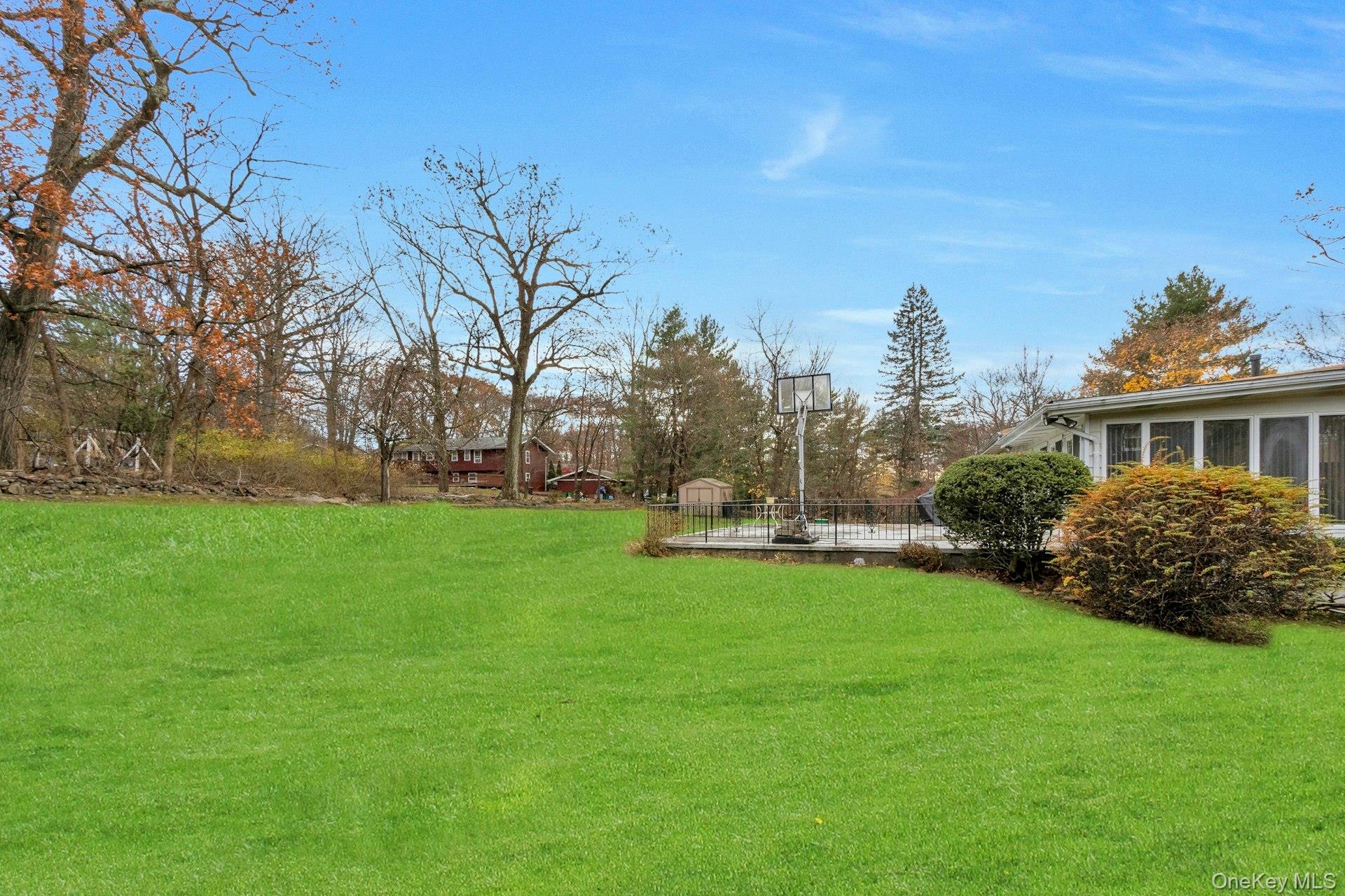44 Greenridge Way Spring Valley, NY 10977 - Photo 38 of 46 a view of a house with backyard and sitting area