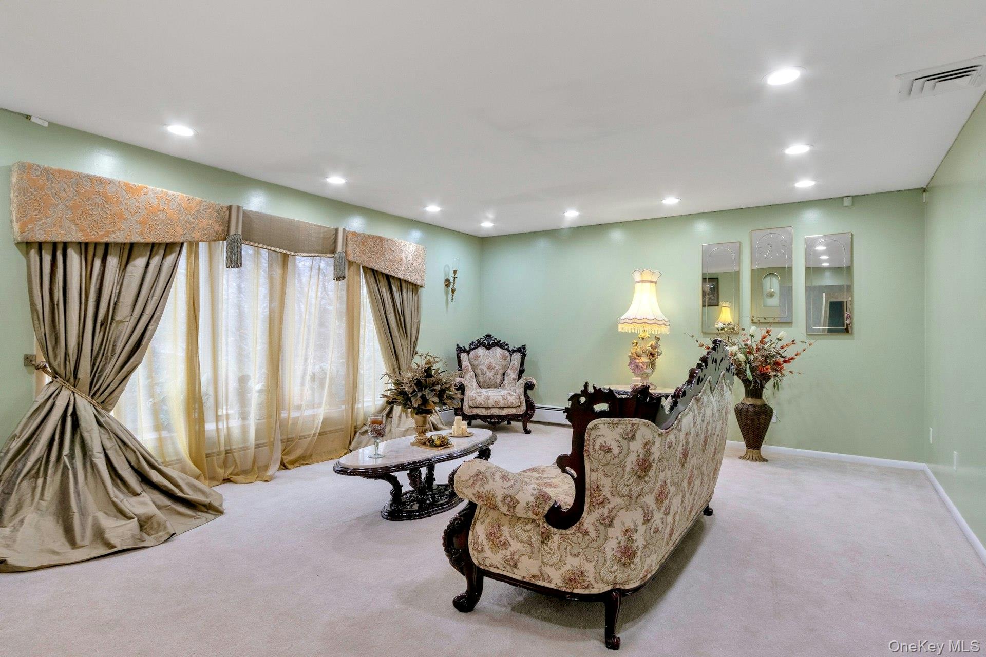 44 Greenridge Way Spring Valley, NY 10977 - Photo 4 of 46 a living room with furniture and a large window