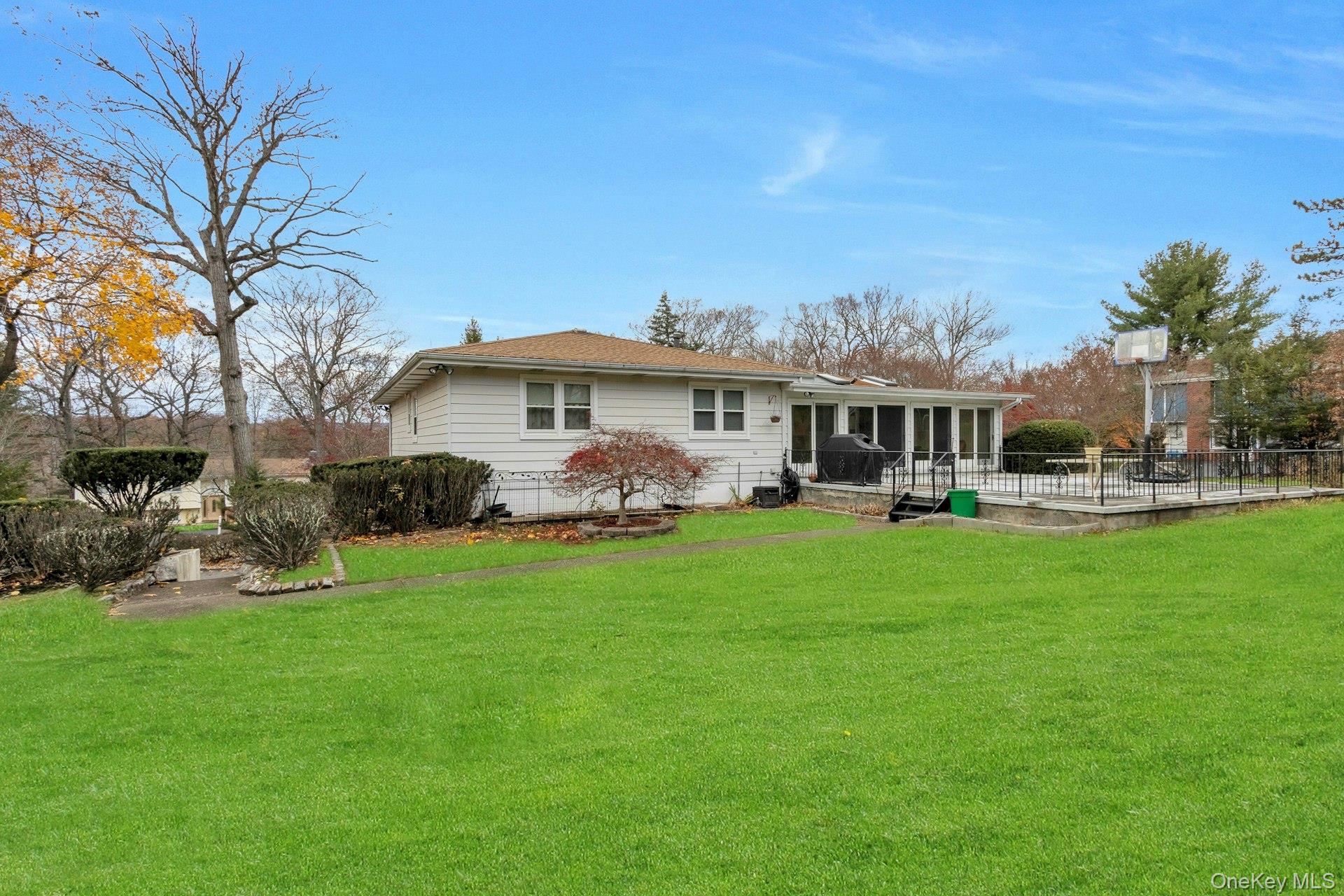 44 Greenridge Way Spring Valley, NY 10977 - Photo 42 of 46 a front view of a house with garden