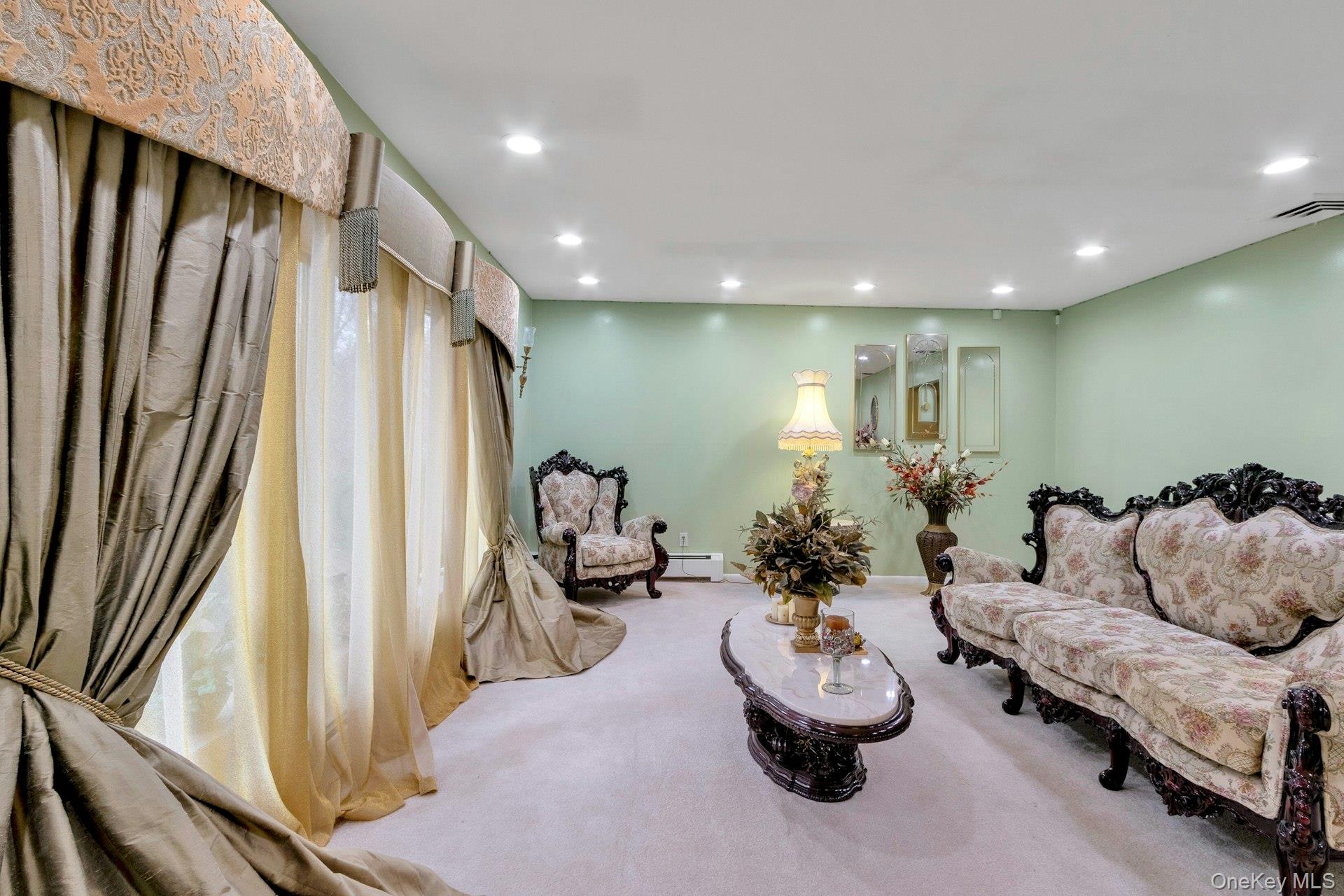 44 Greenridge Way Spring Valley, NY 10977 - Photo 6 of 46 a living room with furniture and a large window