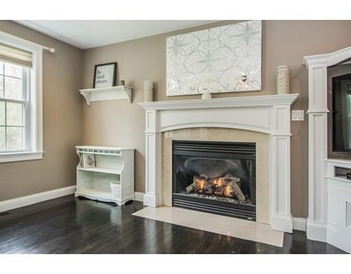 3 Hannon Road Billerica, MA 01862 - Photo 15 of 30 a living room with a fireplace and a fireplace