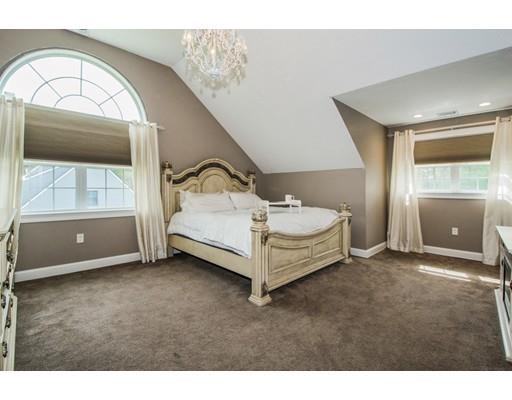 3 Hannon Road Billerica, MA 01862 - Photo 16 of 30 a spacious bedroom with a bed and a window