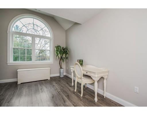 3 Hannon Road Billerica, MA 01862 - Photo 20 of 30 a view of a livingroom with furniture window and wooden floor