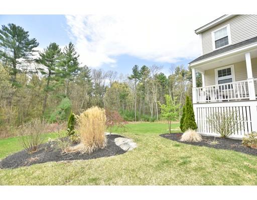 3 Hannon Road Billerica, MA 01862 - Photo 3 of 30 a backyard of a house with table and chairs