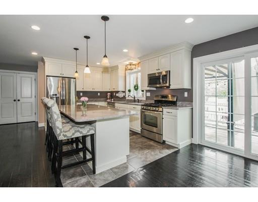 3 Hannon Road Billerica, MA 01862 - Photo 9 of 30 a large kitchen with a table and chairs