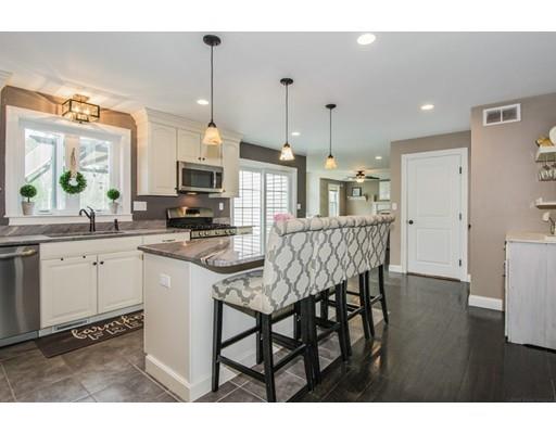 3 Hannon Road Billerica, MA 01862 - Photo 10 of 30 a kitchen with stainless steel appliances granite countertop a kitchen island hardwood floor and a sink