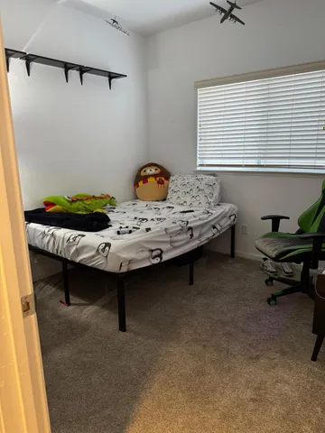 a living room with a baby crib