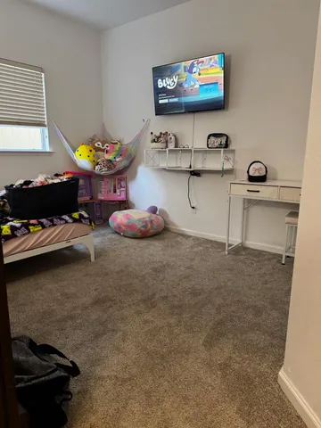 a hallway with washer and dryer