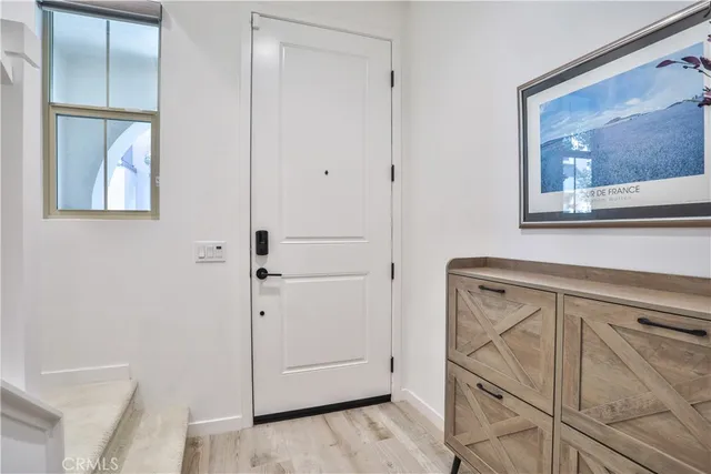 a view of a hallway with front door