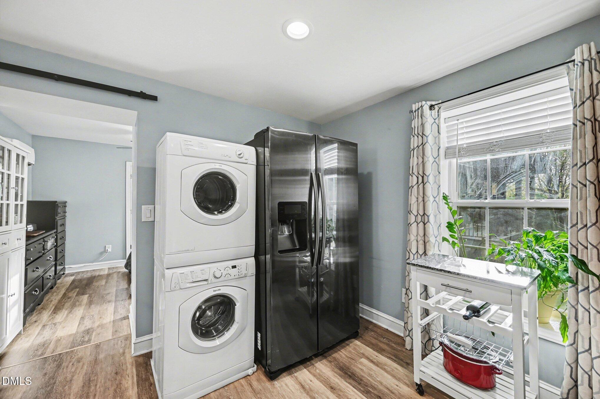 125 Barnhill Street Durham, NC 27707 - Photo 12 of 27 a utility room with dryer and washer