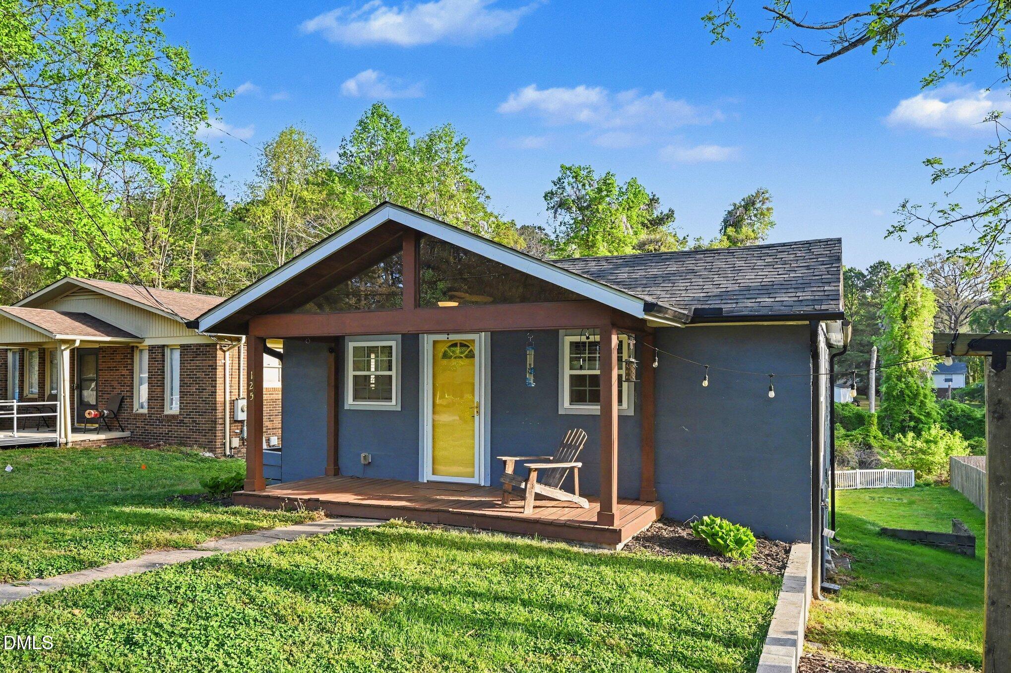 125 Barnhill Street Durham, NC 27707 - Photo 4 of 27 a front view of a house with a yard