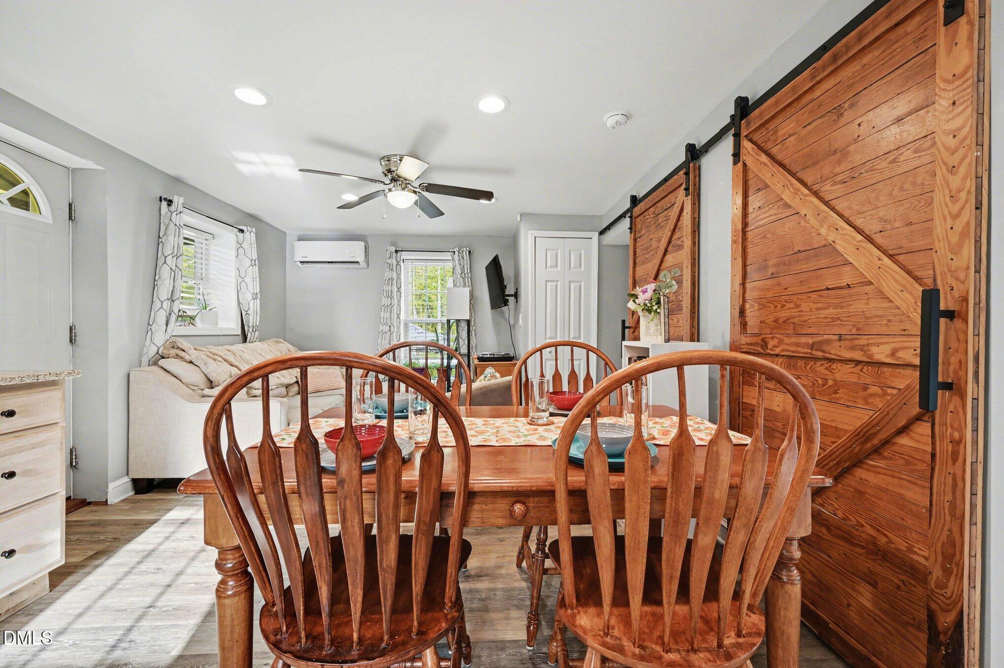 125 Barnhill Street Durham, NC 27707 - Photo 9 of 27 a view of balcony with furniture and a ceiling fan