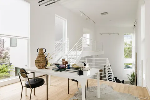 a view of a workspace with furniture