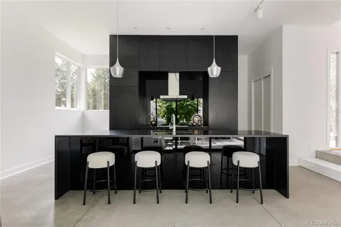 a view of a kitchen area with furniture and window