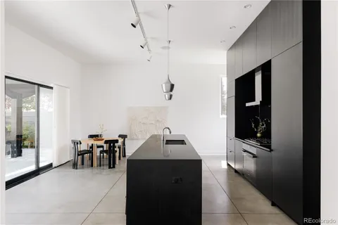 a hallway with a view of living room