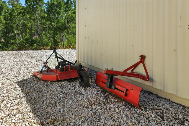 42 Hide Out Paradise, UT 84328 - Photo 35 of 56 Included brush beater and grader blade for tractor