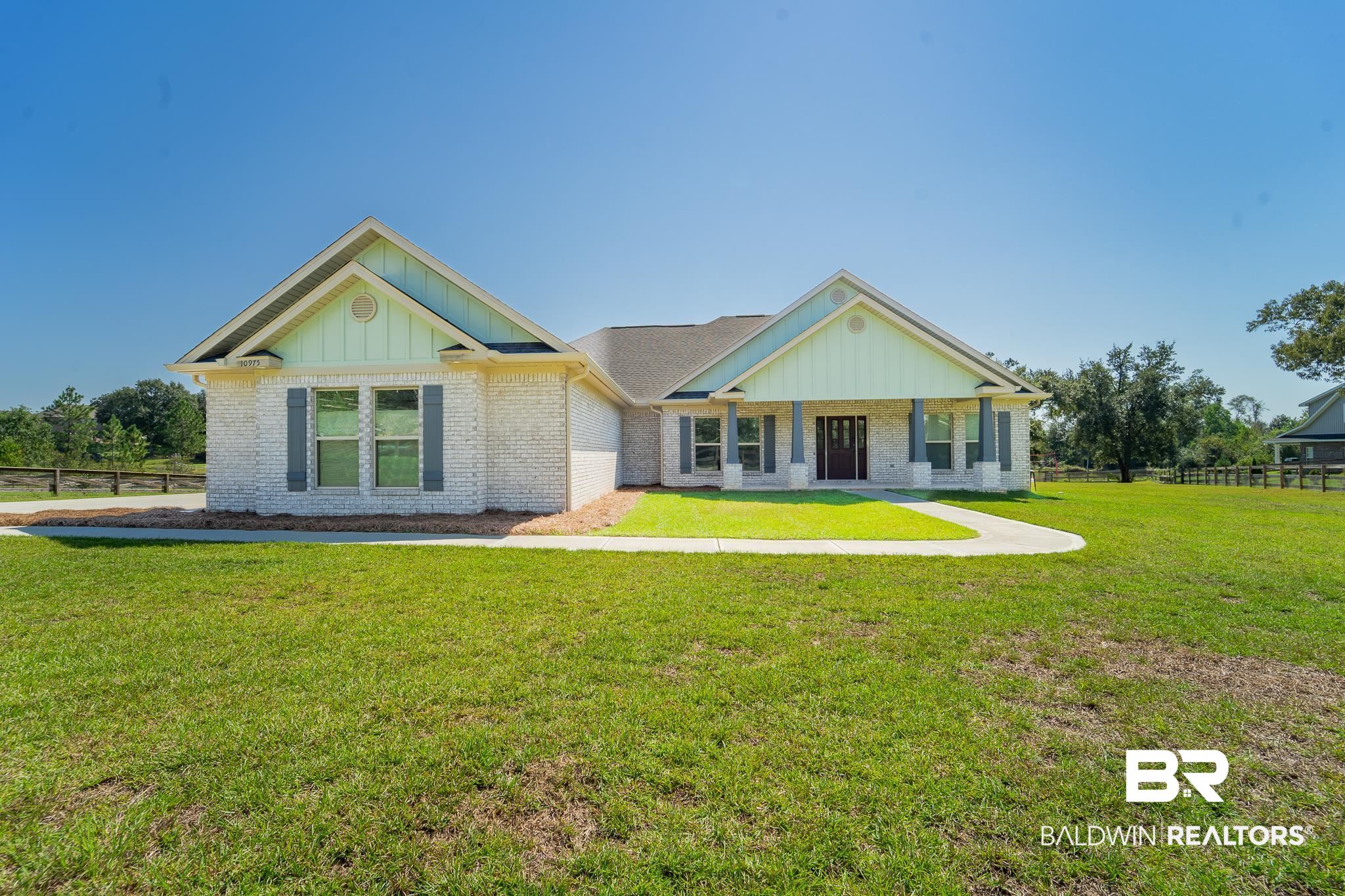 View of front of house with a front lawn