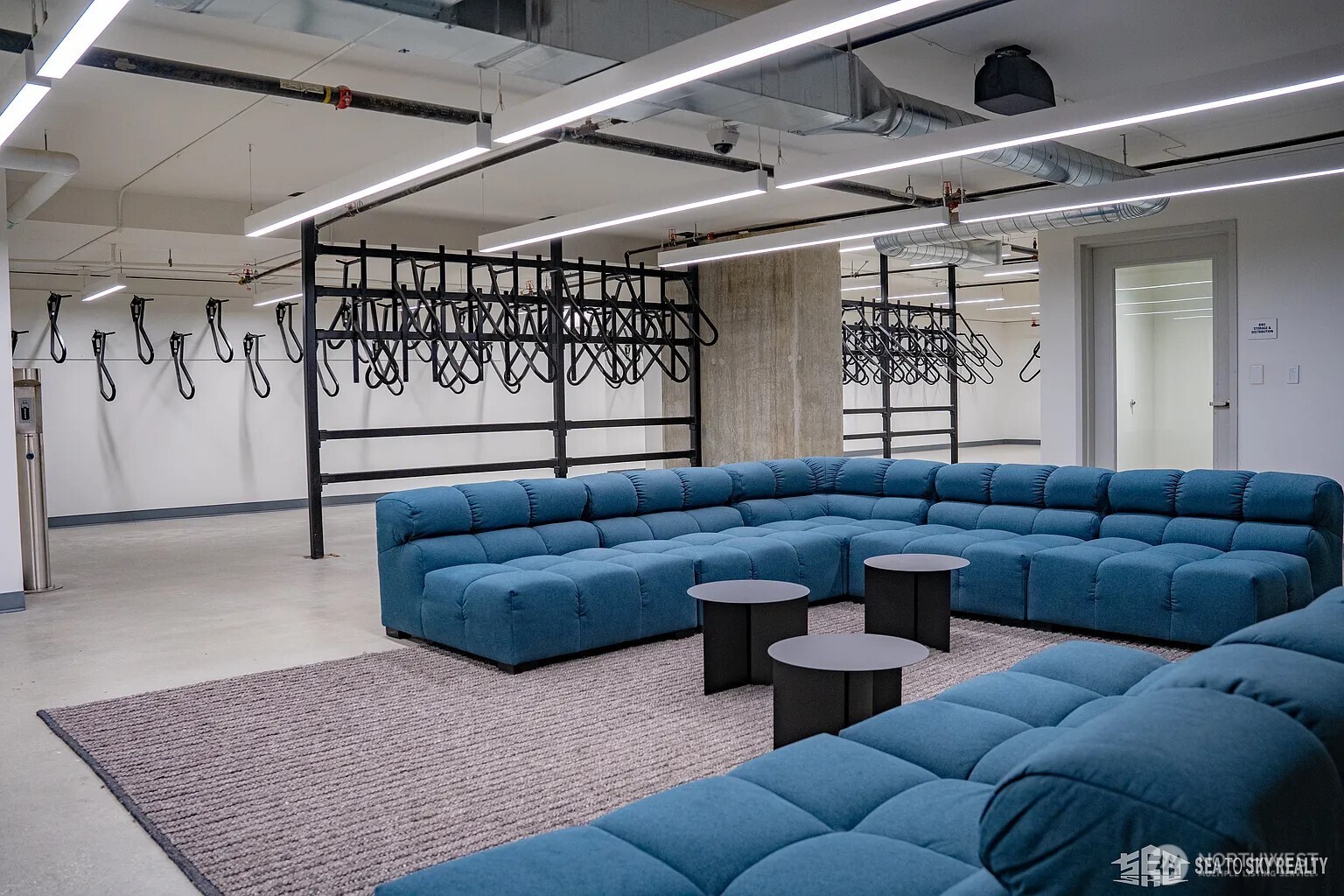 300 Virginia Street, Unit 2210 Seattle, WA 98101 - Photo 27 of 27 a living room with furniture