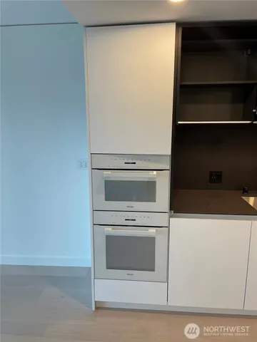 a utility room with washer and dryer