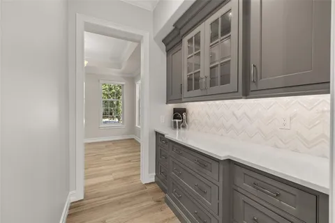 a kitchen with a sink and a window