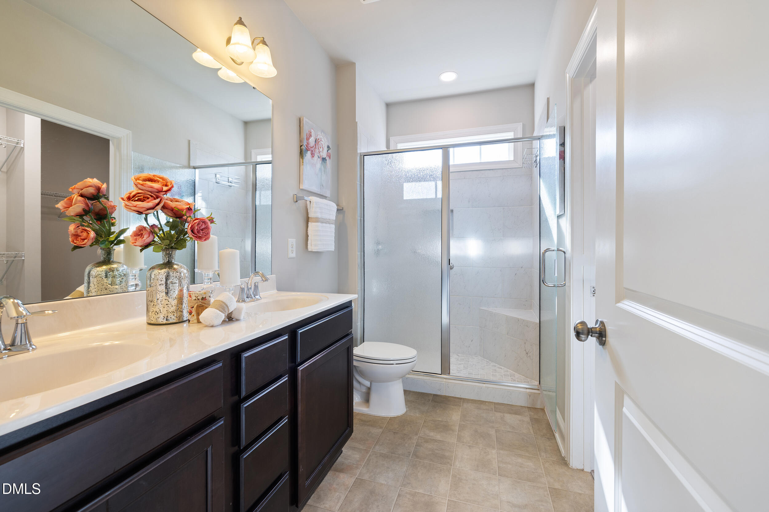 213 Forestville Road Wake Forest, NC 27587 - Photo 7 of 15 a bathroom with a double vanity sink mirror and toilet