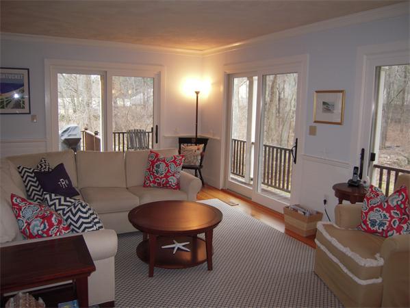 294 Pope Road Acton, MA 01720 - Photo 11 of 30 a living room with furniture and a window