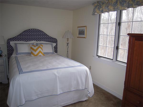 294 Pope Road Acton, MA 01720 - Photo 23 of 30 a bedroom with a bed and window