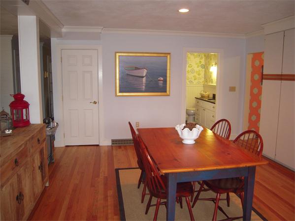 294 Pope Road Acton, MA 01720 - Photo 8 of 30 a dining room with furniture and wooden floor