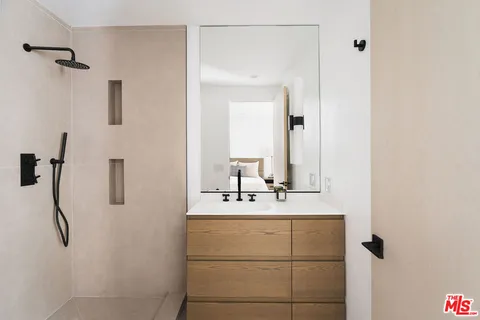 a living room with furniture and a fountain