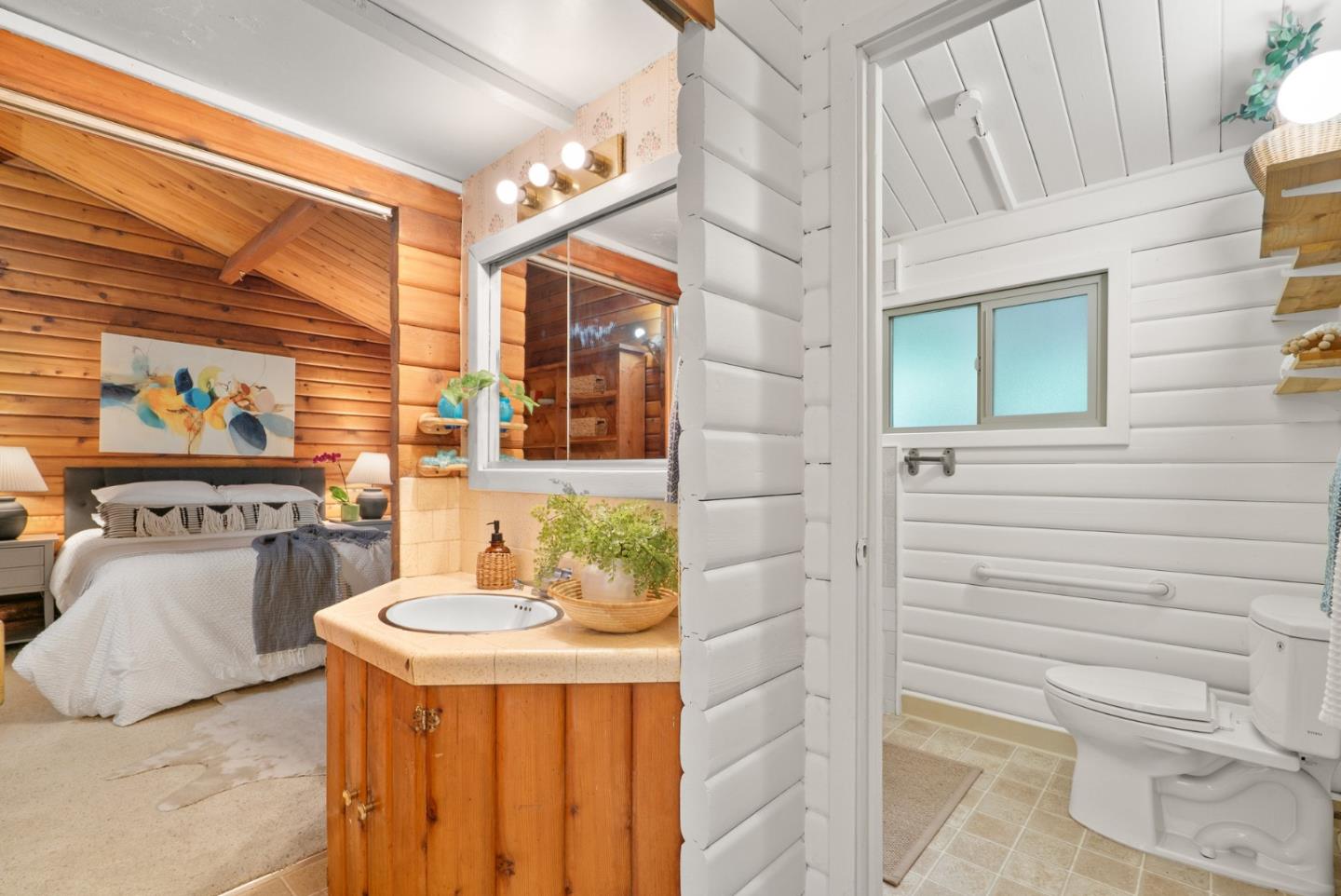 605 Waldeberg Road Ben Lomond, CA 95005 - Photo 20 of 45 a bathroom with a sink and a mirror