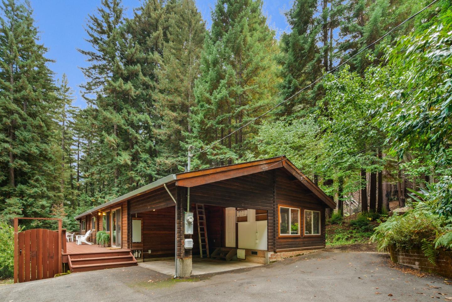 605 Waldeberg Road Ben Lomond, CA 95005 - Photo 3 of 45 a front view of a house with a garden