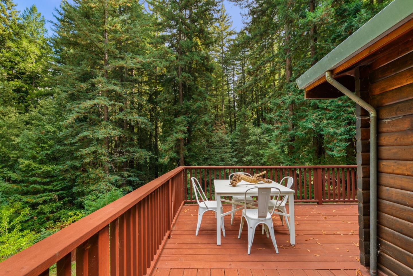 605 Waldeberg Road Ben Lomond, CA 95005 - Photo 32 of 45 a patio with wooden floor and outdoor seating