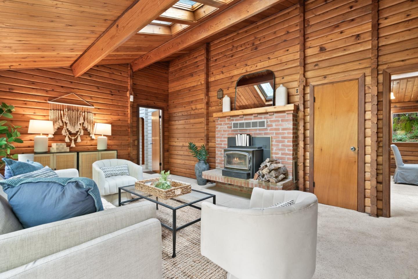 605 Waldeberg Road Ben Lomond, CA 95005 - Photo 5 of 45 a balcony with furniture and a fireplace