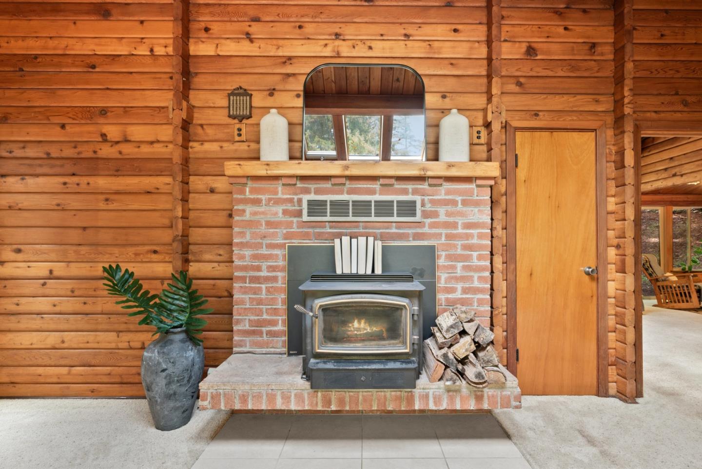 605 Waldeberg Road Ben Lomond, CA 95005 - Photo 6 of 45 a potted plant sitting on the side of a building