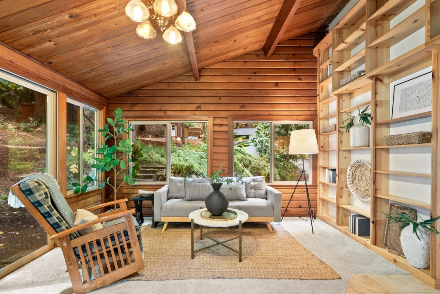 605 Waldeberg Road Ben Lomond, CA 95005 - Photo 7 of 45 a living room with furniture and a large window