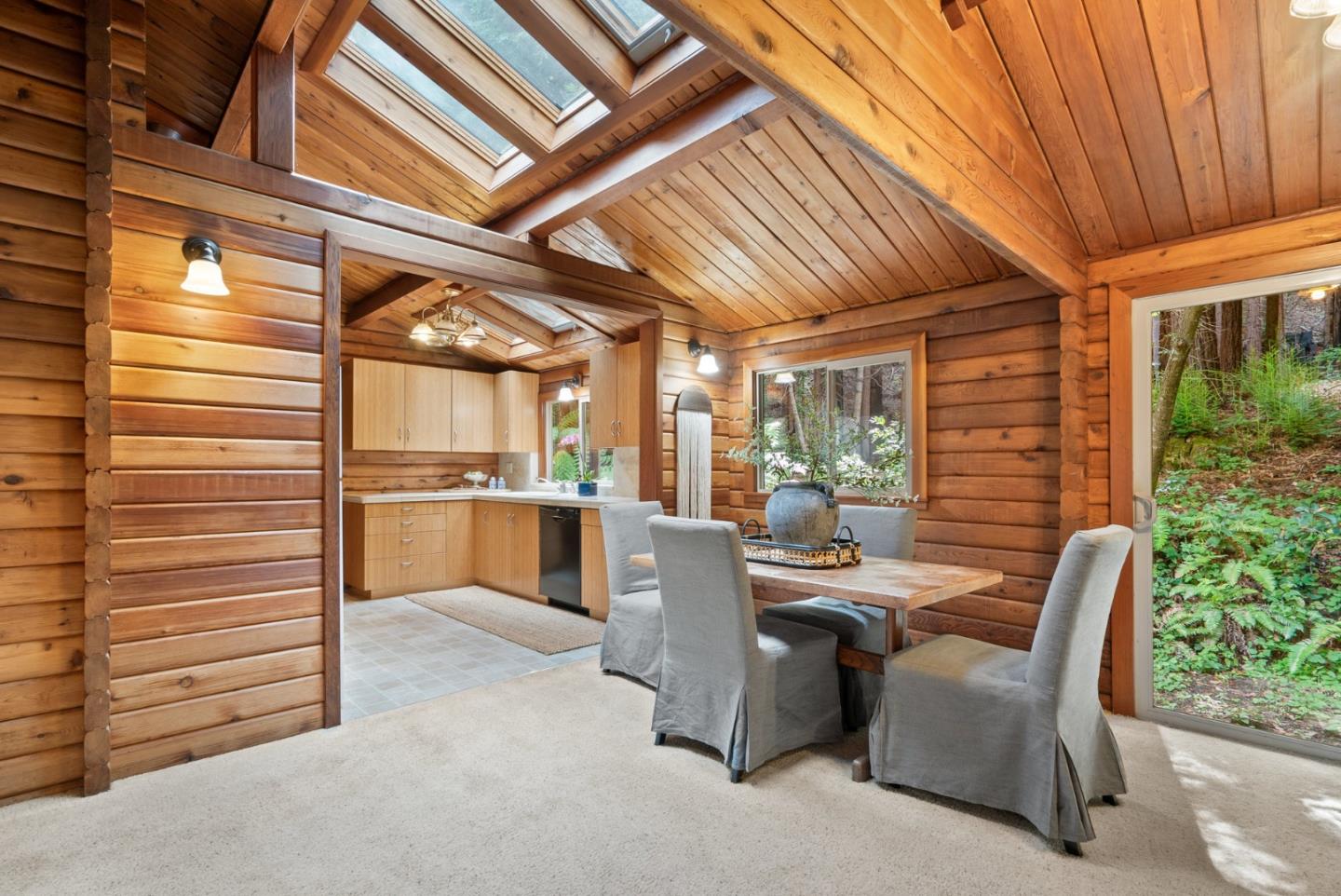 605 Waldeberg Road Ben Lomond, CA 95005 - Photo 10 of 45 a dining room with furniture and a kitchen view