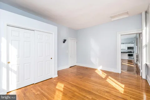a view of a livingroom with wooden floor