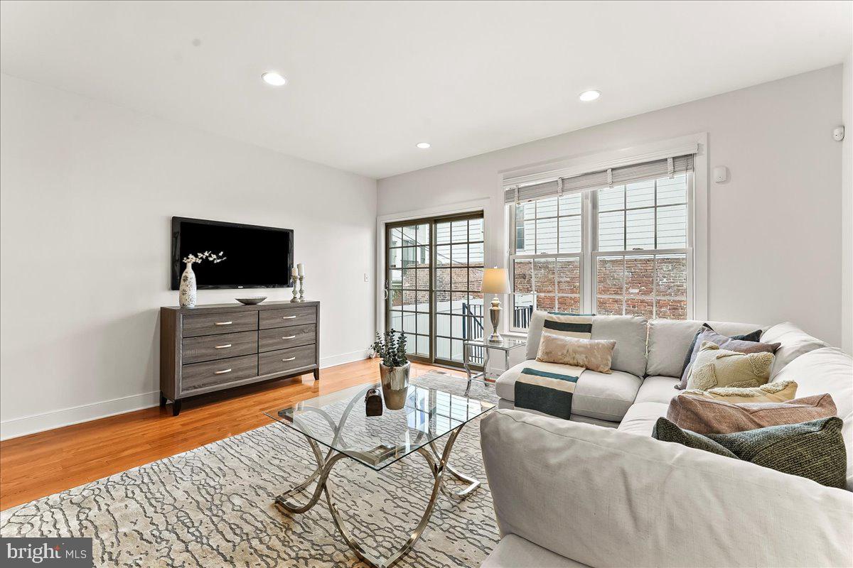 677 North 15th Street Philadelphia, PA 19130 - Photo 16 of 52 a living room with furniture and a flat screen tv