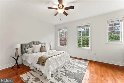 a bathroom with a sink a mirror and vanity