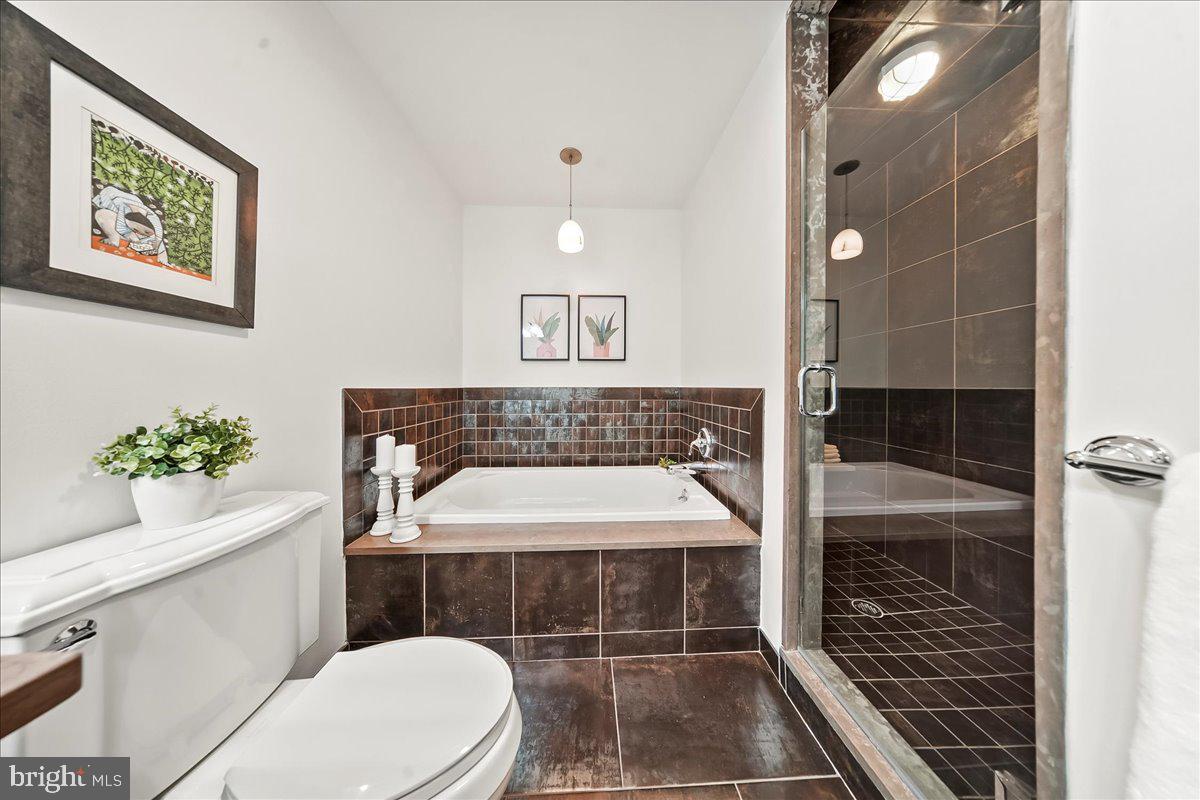 677 North 15th Street Philadelphia, PA 19130 - Photo 35 of 52 a bathroom with a sink toilet and shower