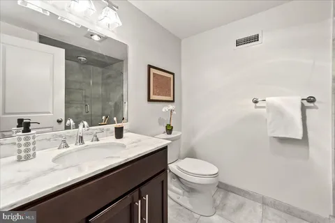 a view of city with tall buildings