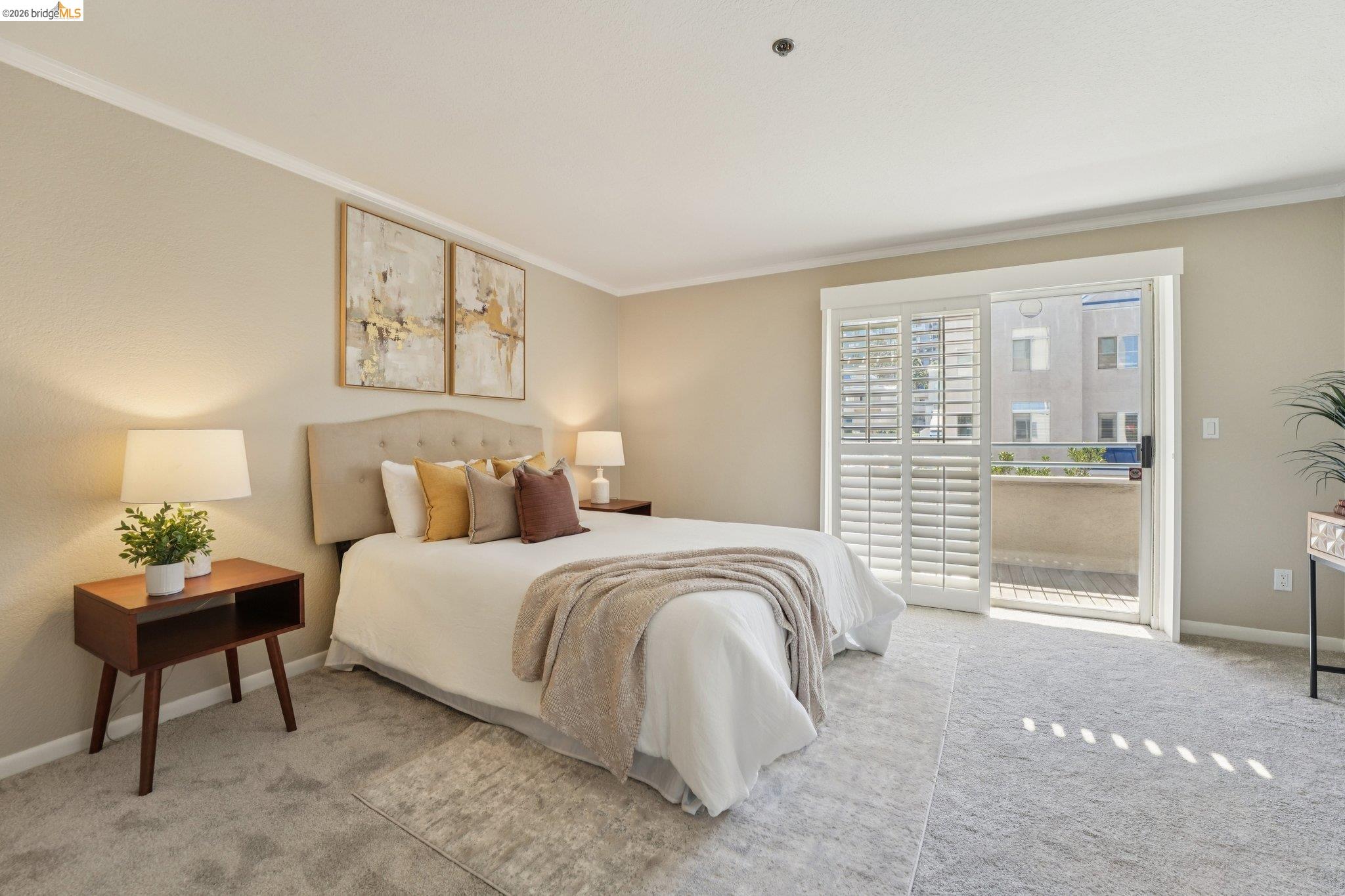 535 Pierce Street, Unit 3216 Albany, CA 94706 - Photo 30 of 47 Bedroom with light carpet, ornamental molding, and access to exterior