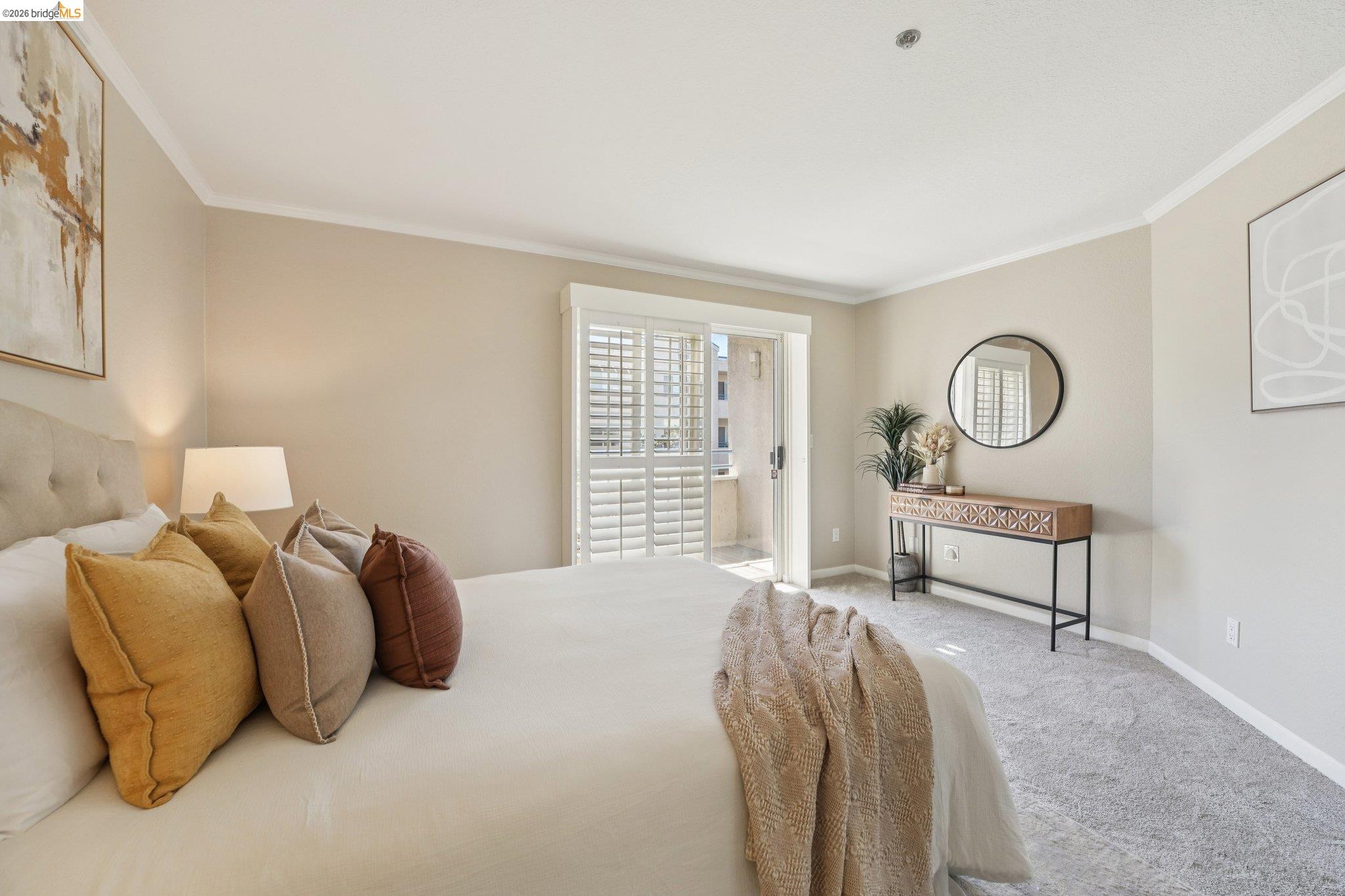535 Pierce Street, Unit 3216 Albany, CA 94706 - Photo 31 of 47 Bedroom featuring carpet flooring, ornamental molding, and ensuite bath