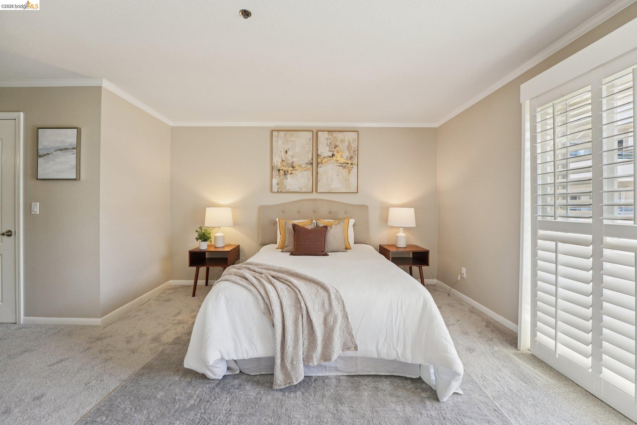 535 Pierce Street, Unit 3216 Albany, CA 94706 - Photo 33 of 47 Carpeted bedroom featuring ornamental molding and baseboards