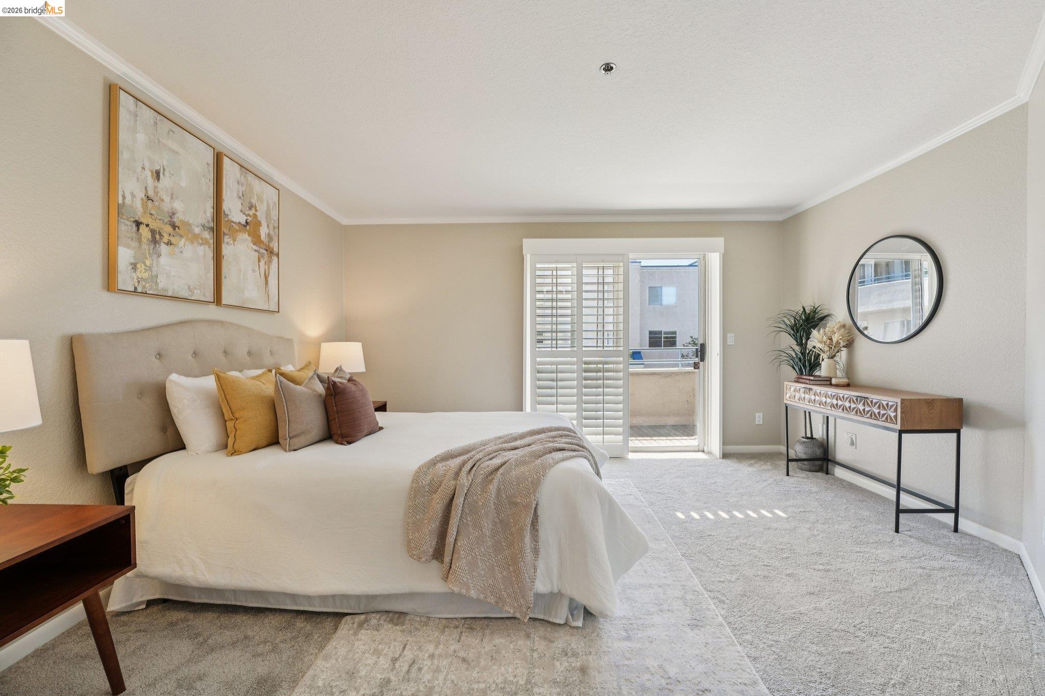 535 Pierce Street, Unit 3216 Albany, CA 94706 - Photo 36 of 47 Bedroom with light colored carpet and crown molding