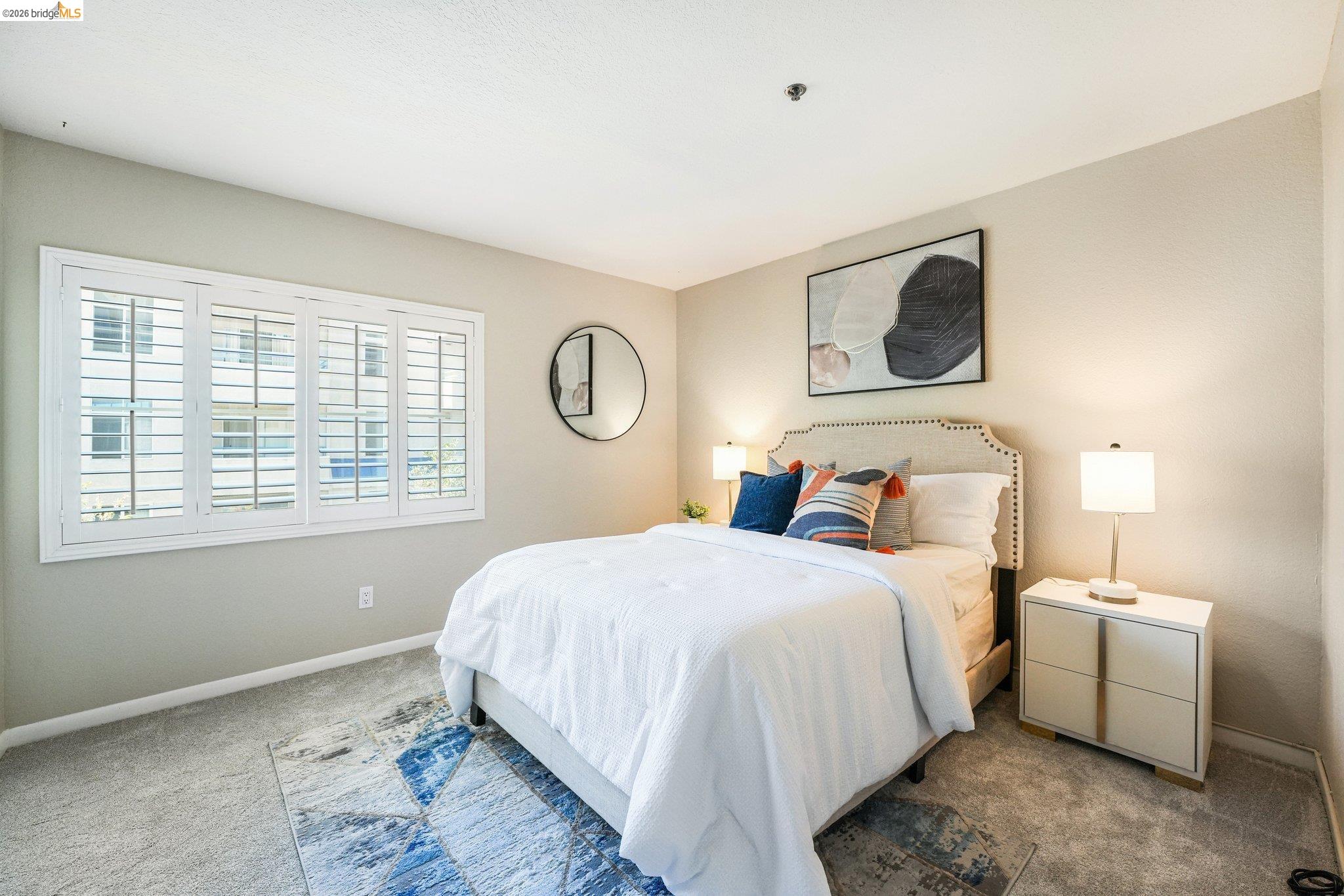 535 Pierce Street, Unit 3216 Albany, CA 94706 - Photo 37 of 47 Carpeted bedroom featuring baseboards