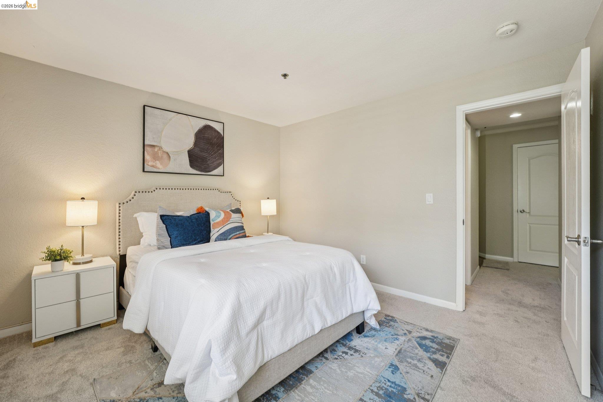 535 Pierce Street, Unit 3216 Albany, CA 94706 - Photo 39 of 47 Bedroom featuring light colored carpet and baseboards