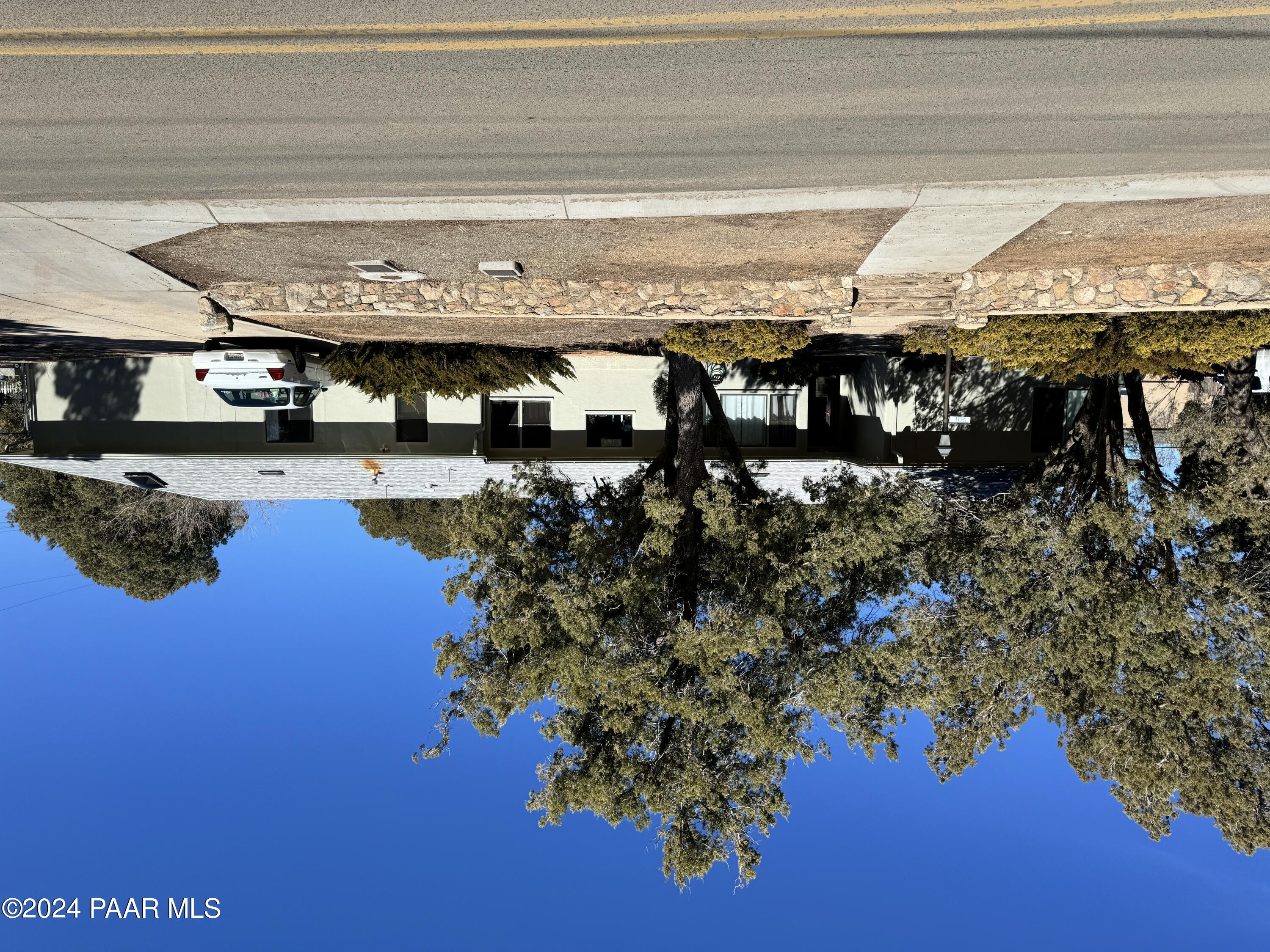 a view of a building with a street