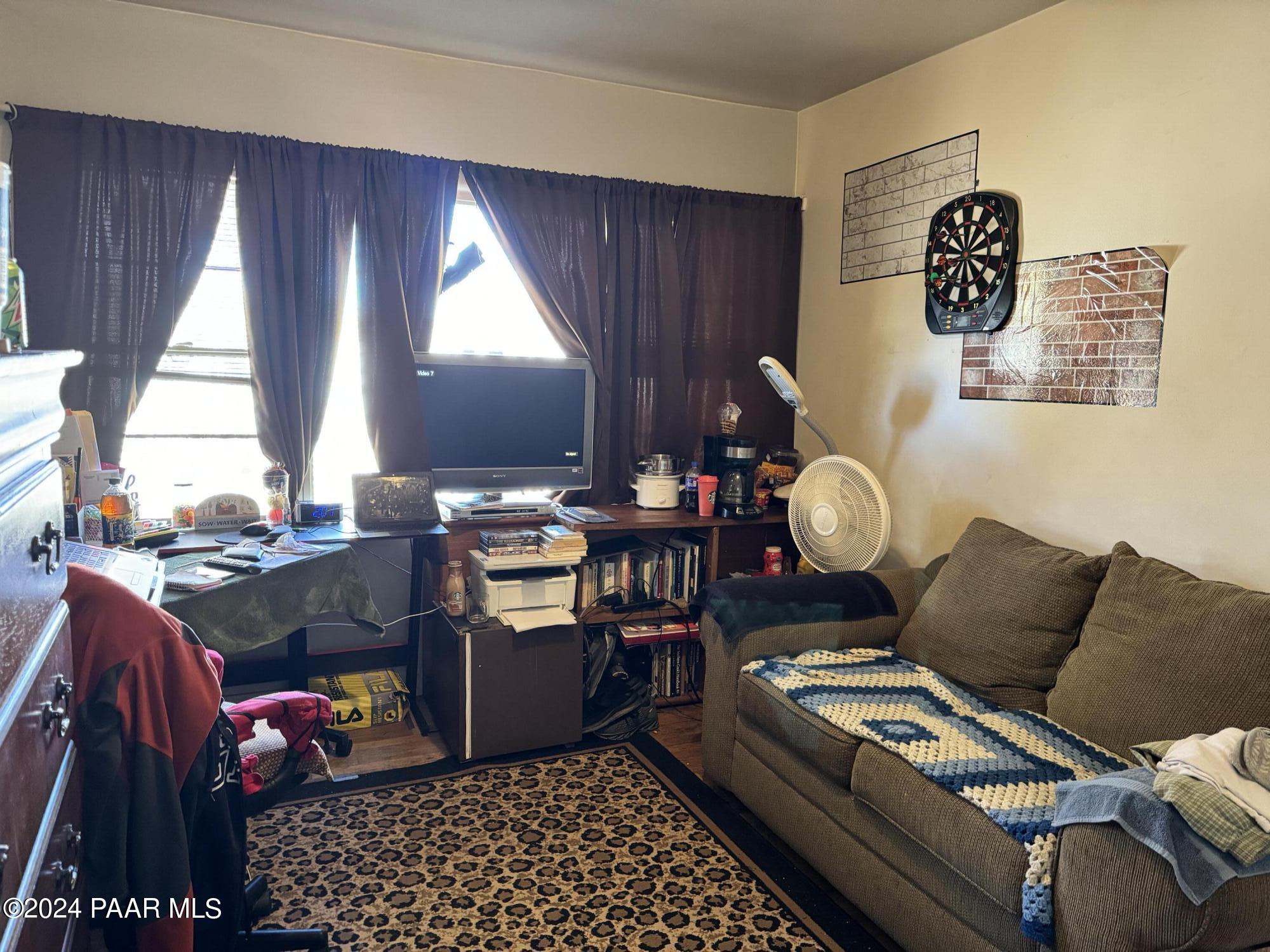 201 Robinson Drive Prescott, AZ 86303 - Photo 20 of 52 a living room with furniture and a window